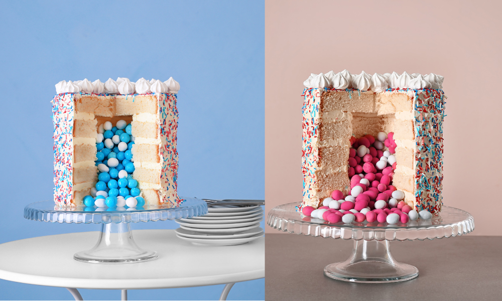 A split cake revealing blue and pink candies inside, perfect for a creative baby announcement with surprise layers.