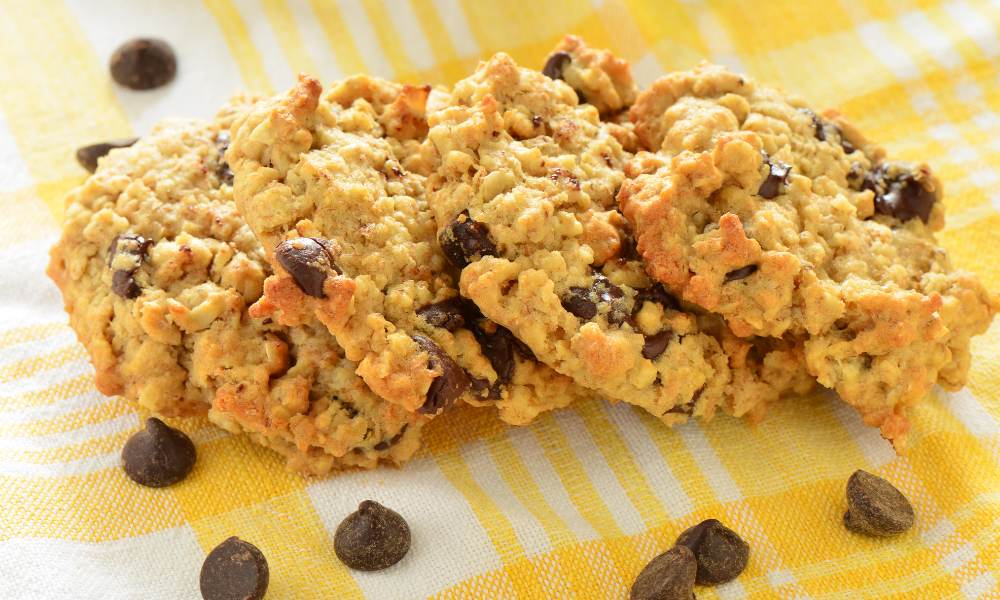 Stack of soft and chewy protein cookies made with oats and vegan protein powder.