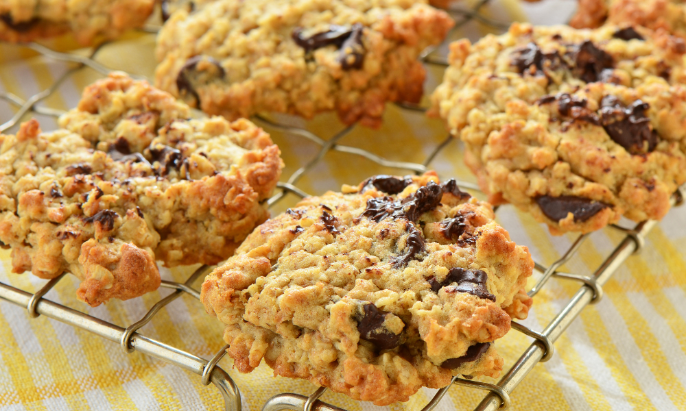 Protein Cookies {4 Ingredients!} 40g Protein!! 12 Delicious 4-ingredient protein cookies packed with 40g of protein, cooling on a wire rack.