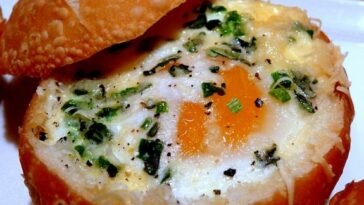 Baked Eggs in Bread Bowls
